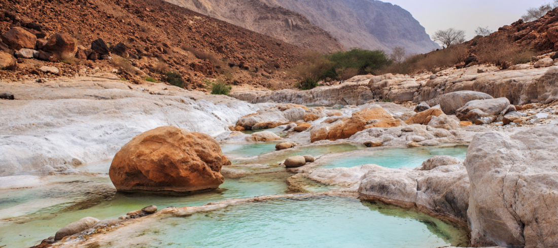 Natural sulphur pools along Wadi Al Dhahir hiking trail in Fujairah UAE